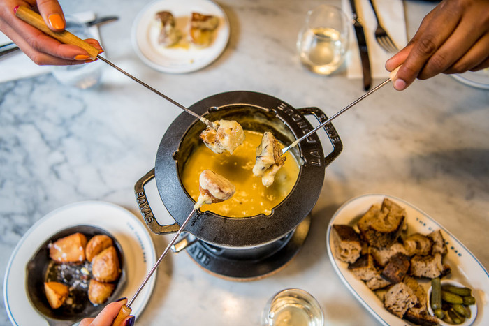 discover-the-best-christmas-specials-774e5d17f32c79e672184ce0c0c0aa3df39cd2ed_thecheesebarfonduenight.jpeg